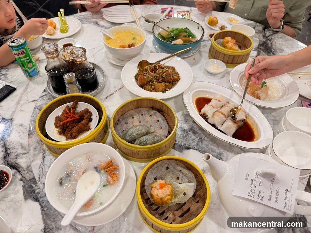 Dining Table with Dim Sum and Chinese Cuisine