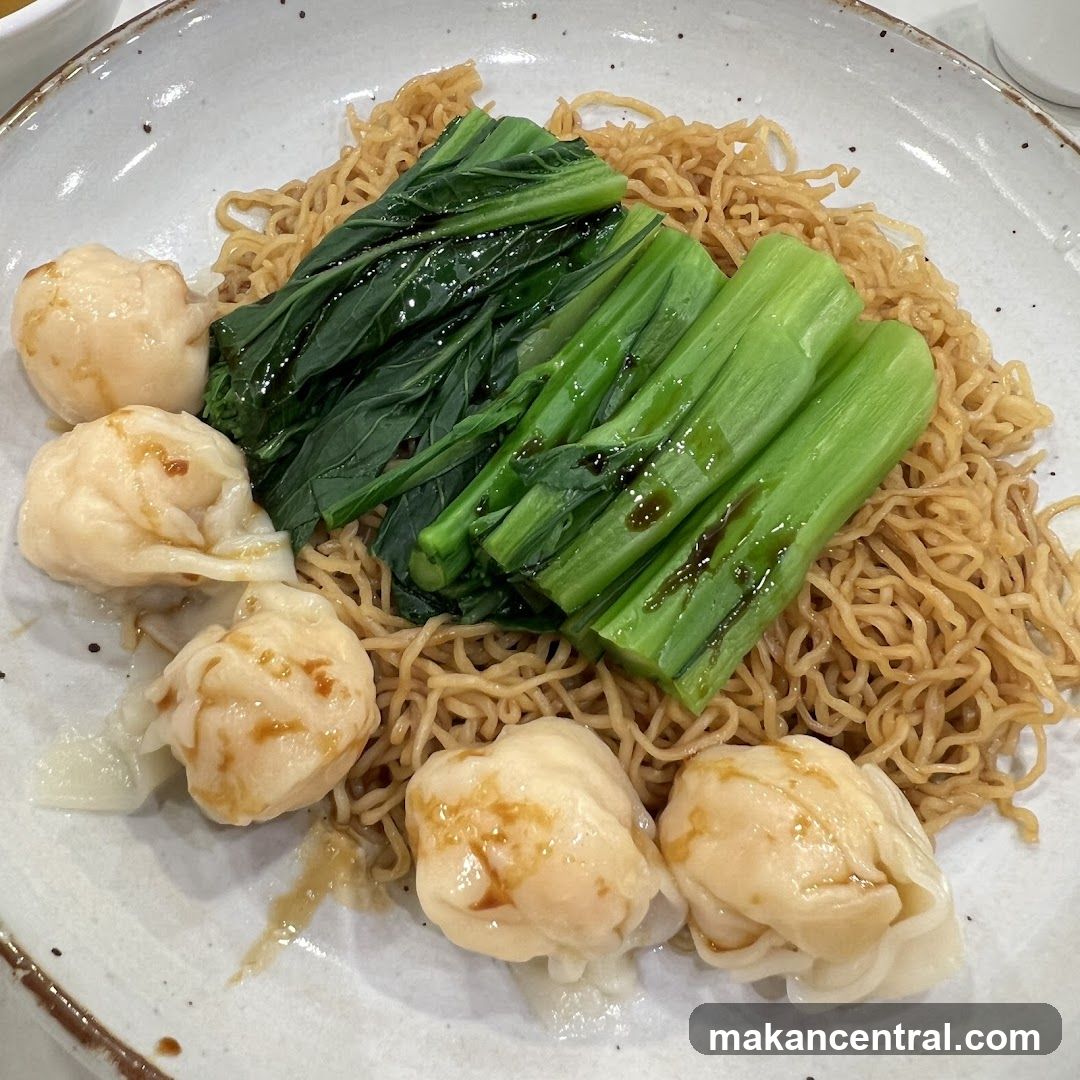Noodle Dish with Dumplings and Greens