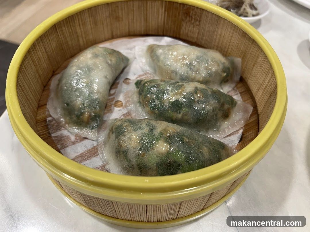 Steamed dumplings in bamboo steamer