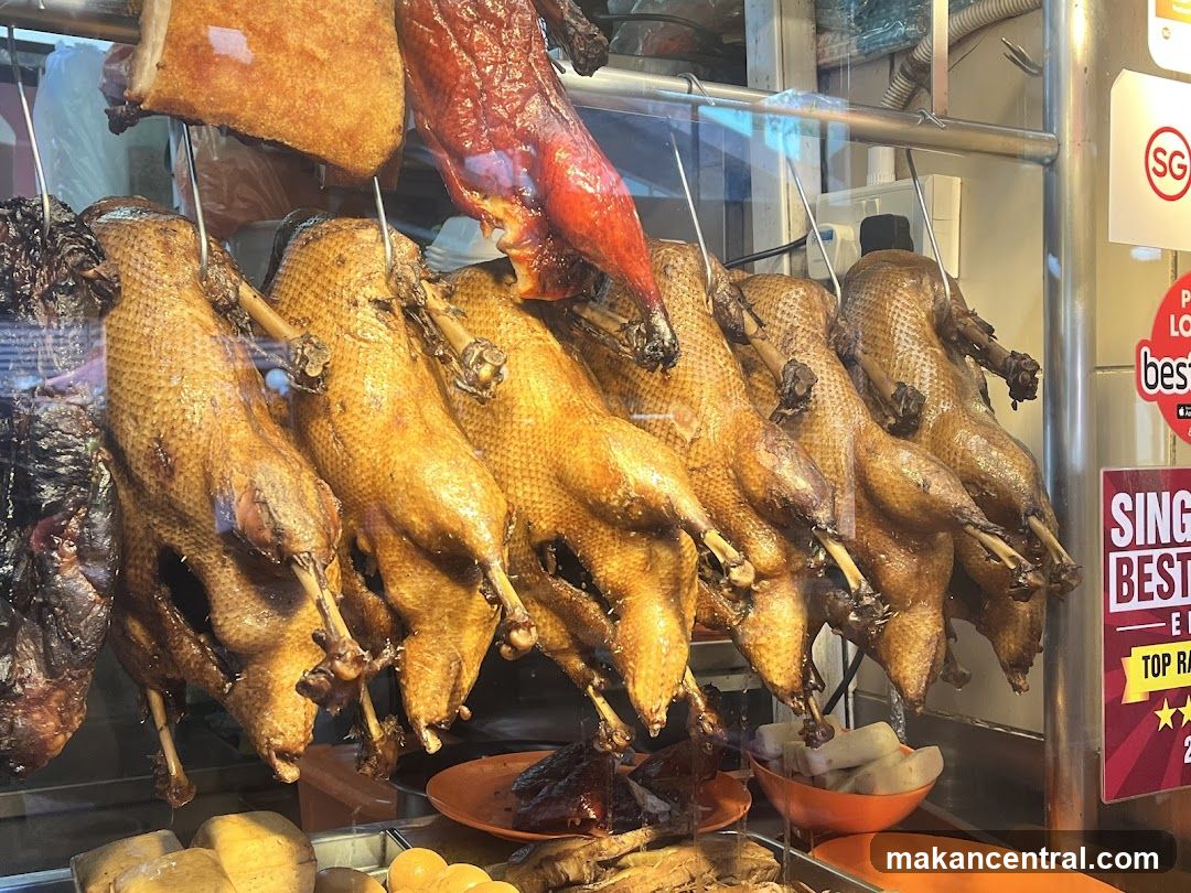 Roasted ducks display at food stall