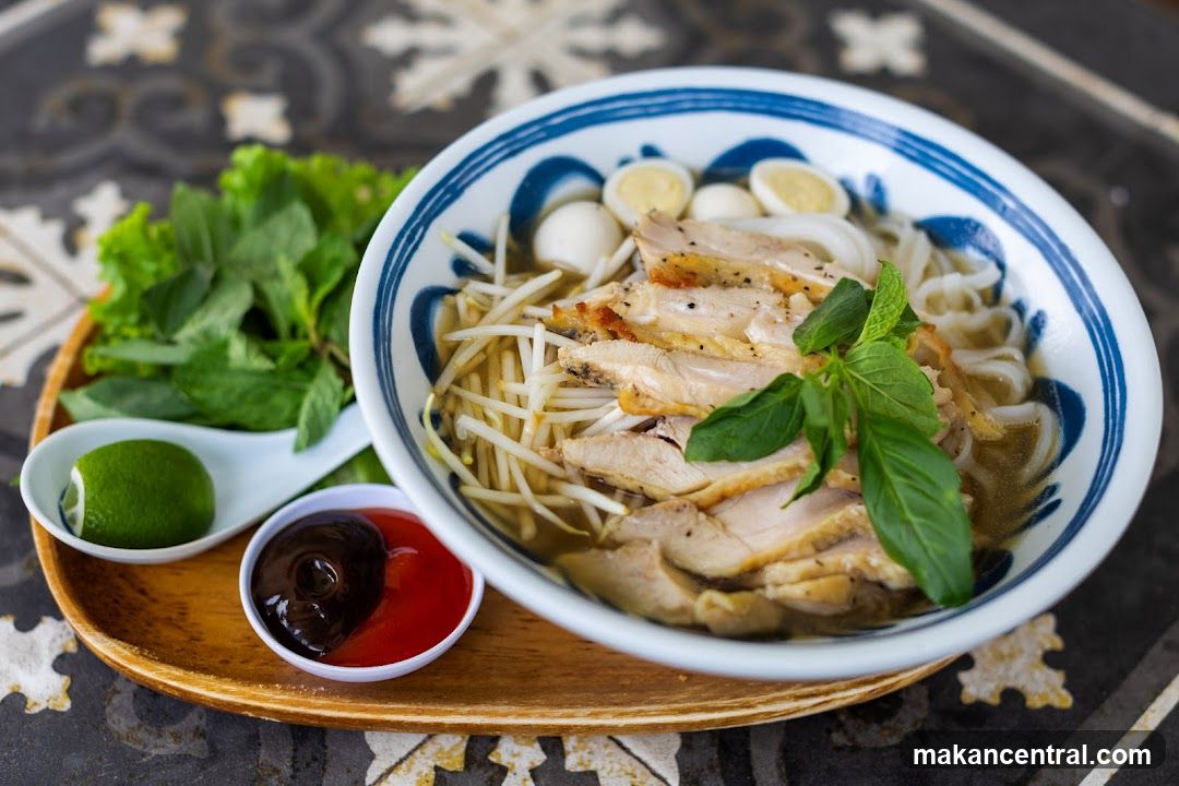 Vietnamese noodle bowl with garnishes