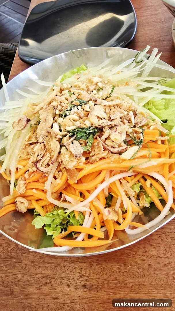 Salad on wooden table
