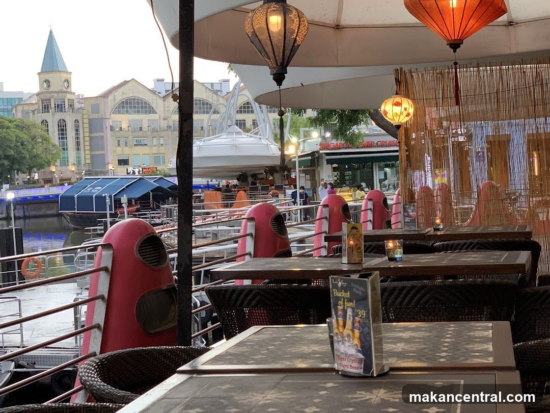 Outdoor seating area overlooking river