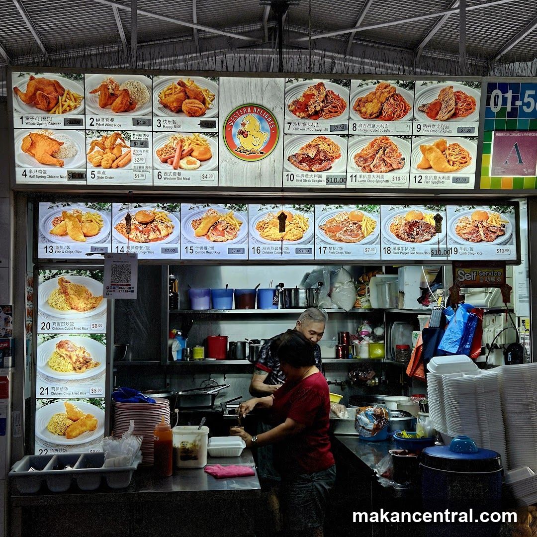 Food stall interior with staff preparing food
