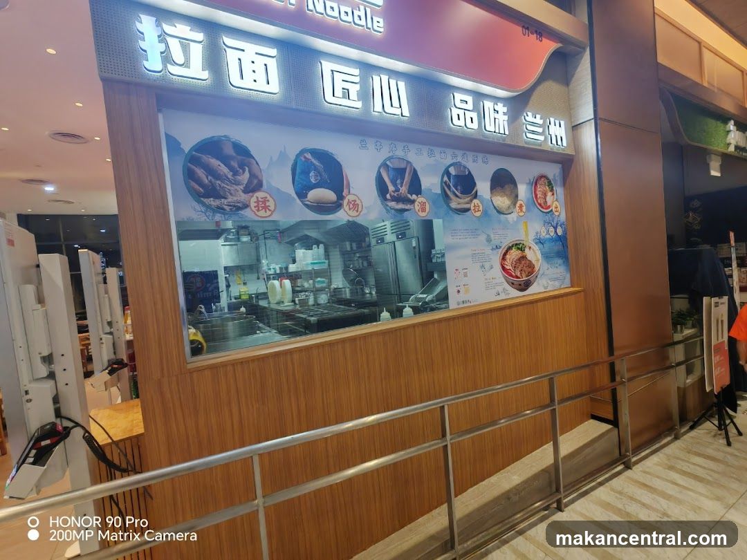 Restaurant storefront with glass window and promotional display