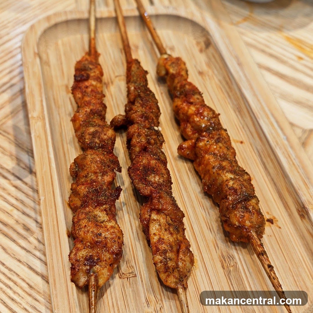 Grilled Skewers on Wooden Board