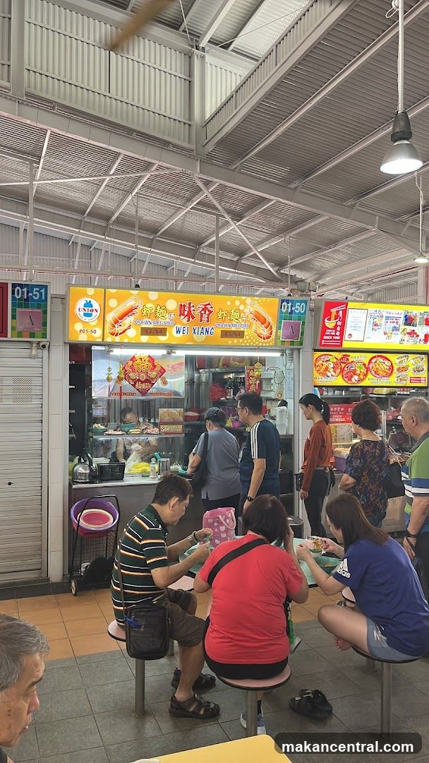 Food court interior with customers and stalls