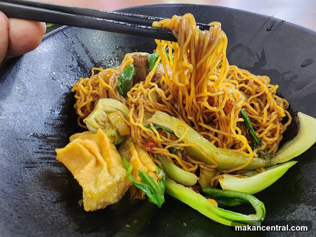 Noodles in black bowl