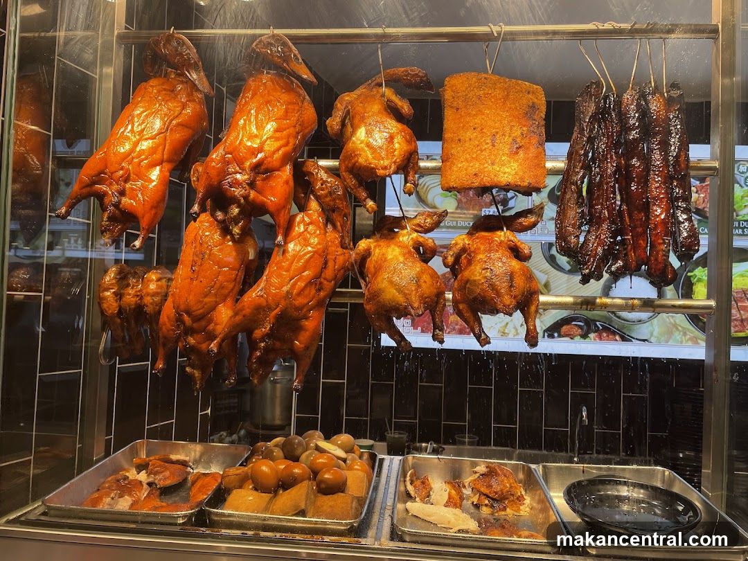 Roasted meat display in food stall