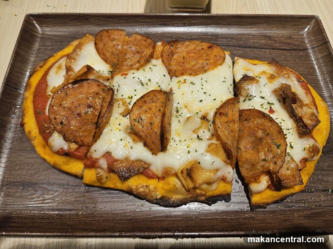 Pizza on wooden tray