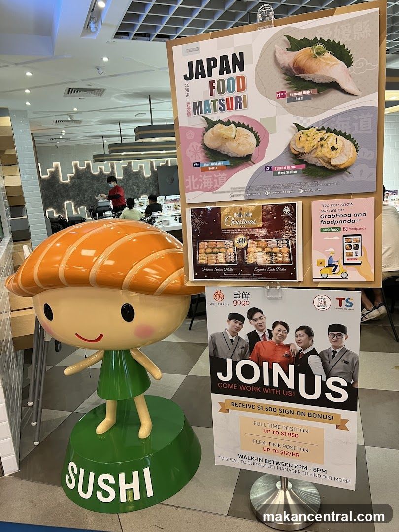 Sushi-themed promotional display in a food court