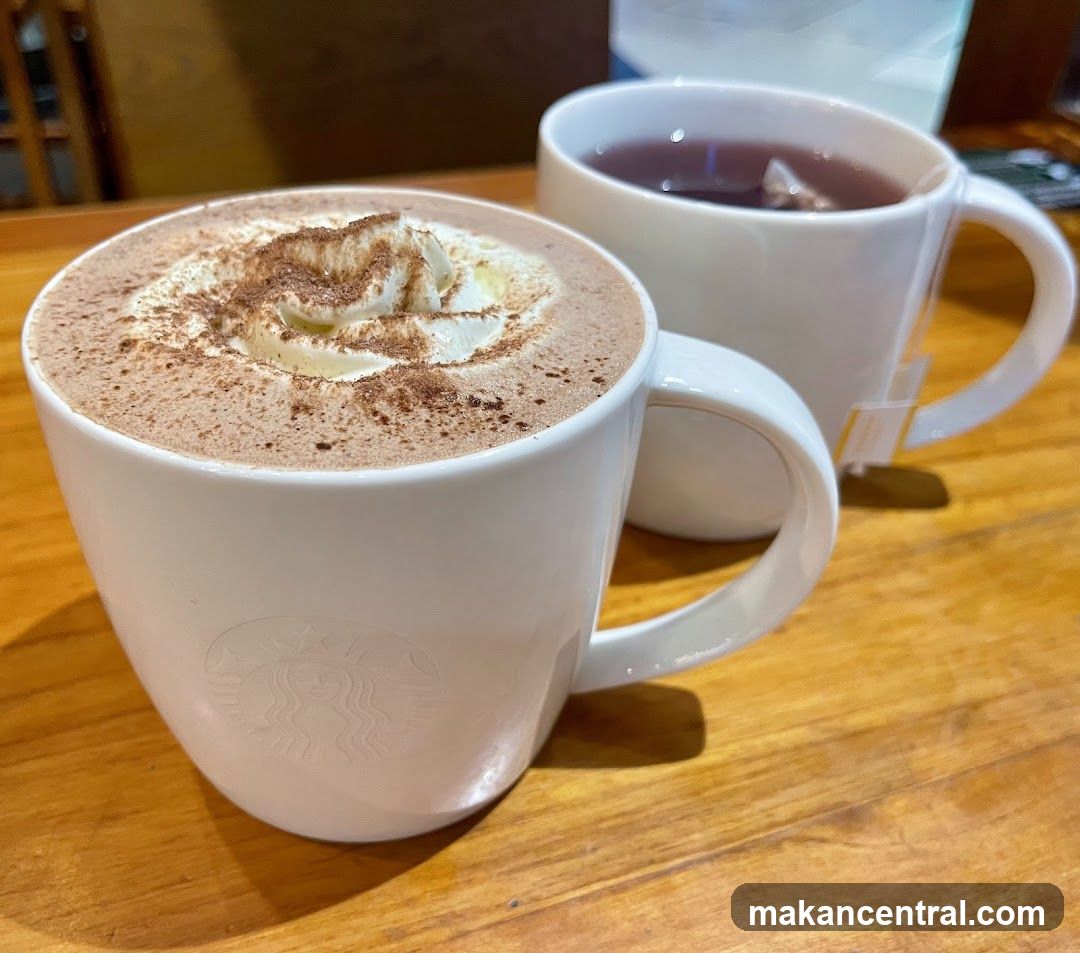 Starbucks Coffee Cup on Wooden Table