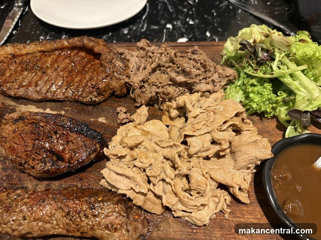 Grilled Meat Platter with Salad and Sauce