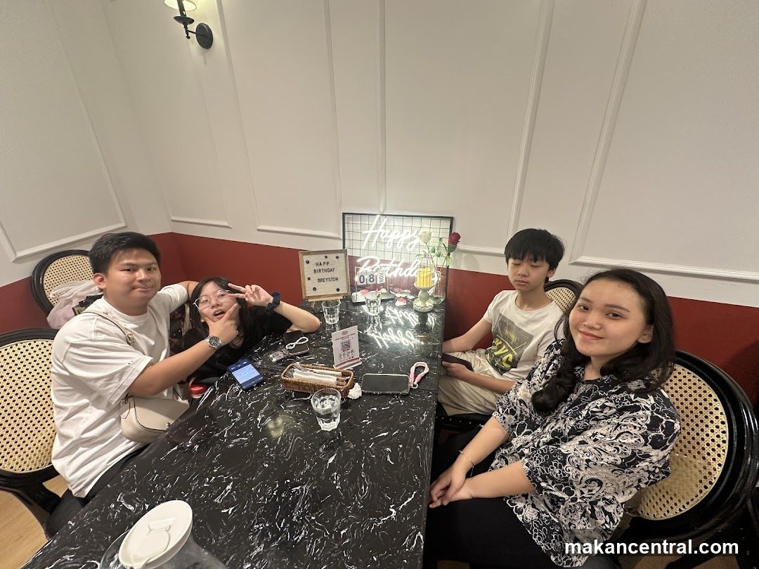 Group photo at dining table