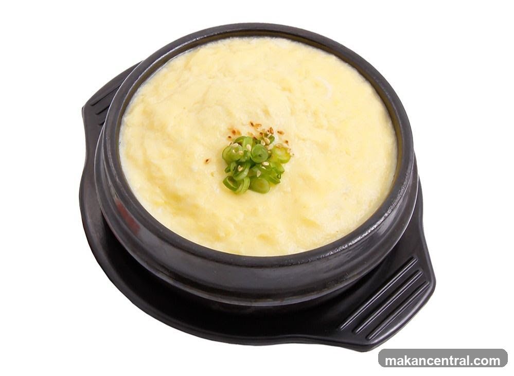 Stir-fried egg dish in a stone pot