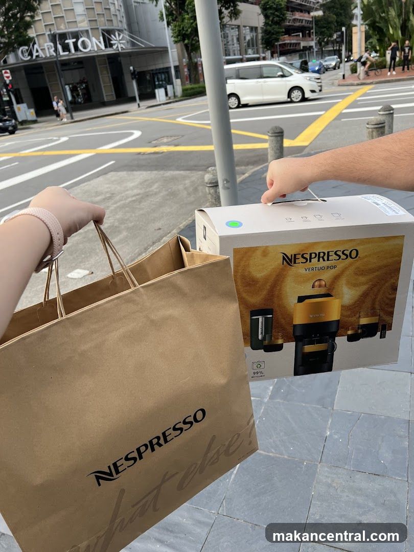 Nespresso shopping items on sidewalk