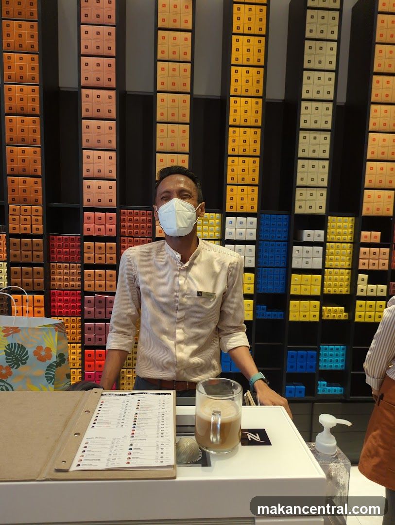 Staff member at counter