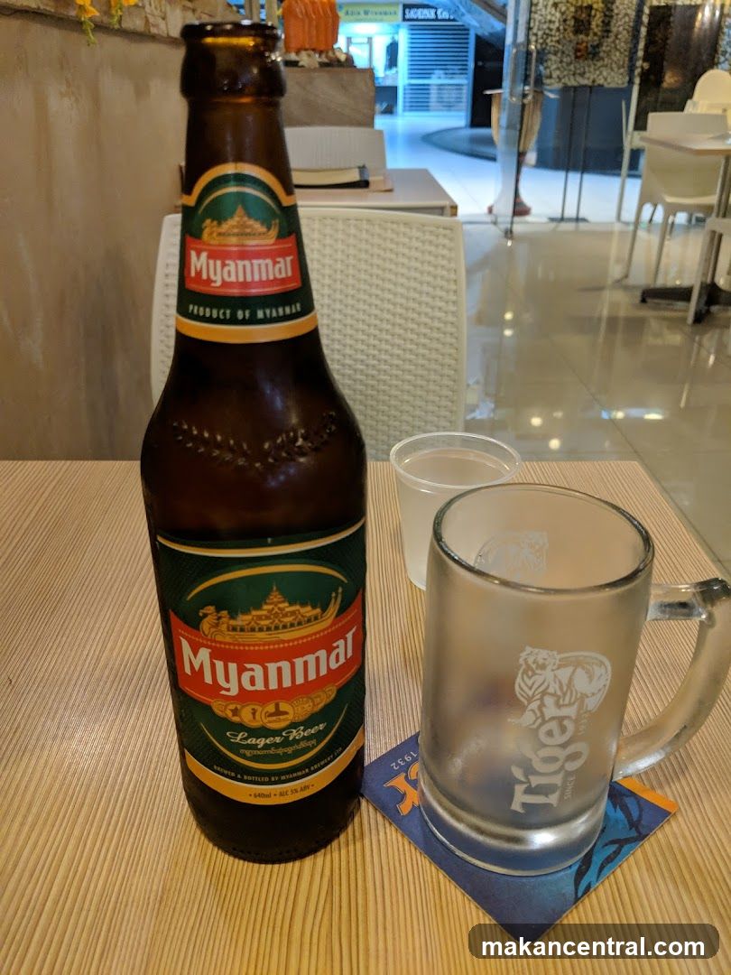 Beer and Glass on Table