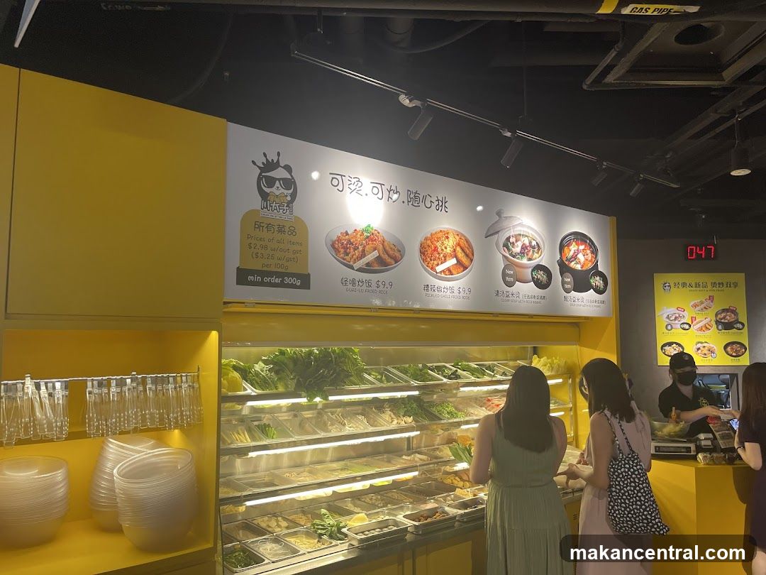 Interior of a food stall with yellow decor