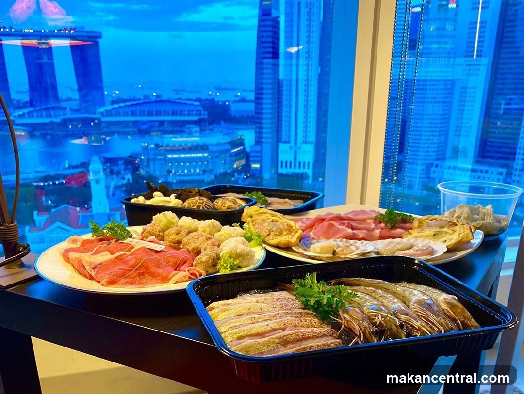 Hot pot meal display with city view