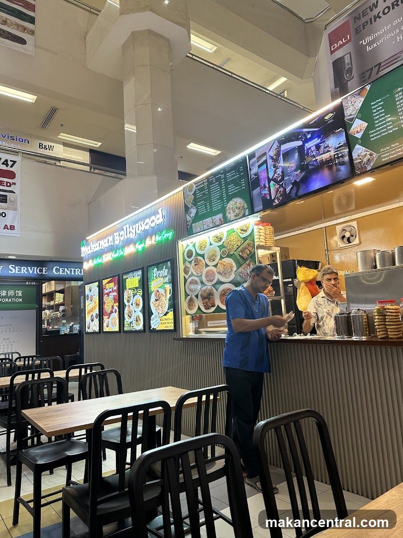 Food court interior with Indian restaurant stall
