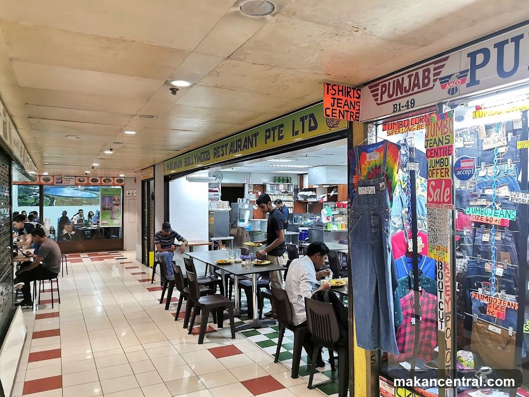Interior of a shopping mall corridor with adjacent shops