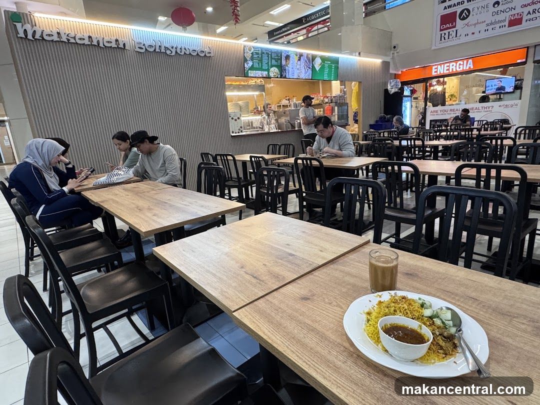 Food court interior with patrons and dining area