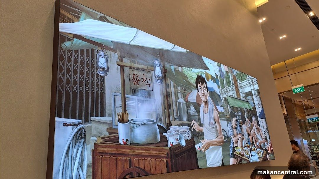 Interior mural depicting a street food scene