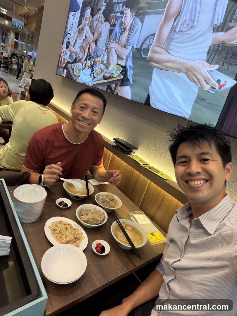 Two men dining inside a restaurant