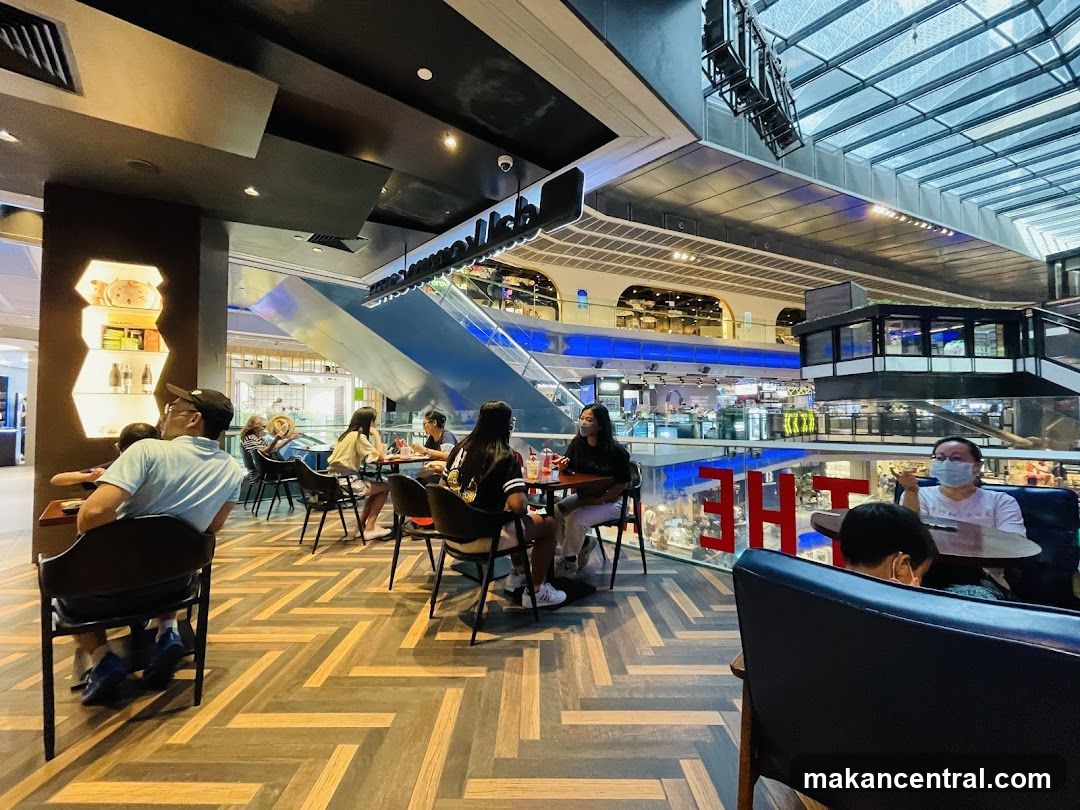 Interior of a multi-level shopping mall dining area
