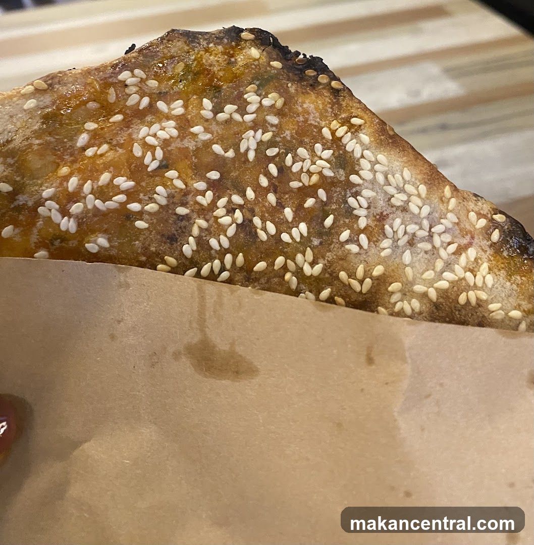 Sesame-Topped Food Item