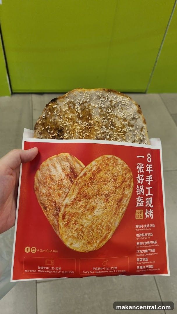 Hand holding packaged food product