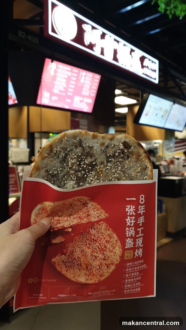 Hand holding packaged food item