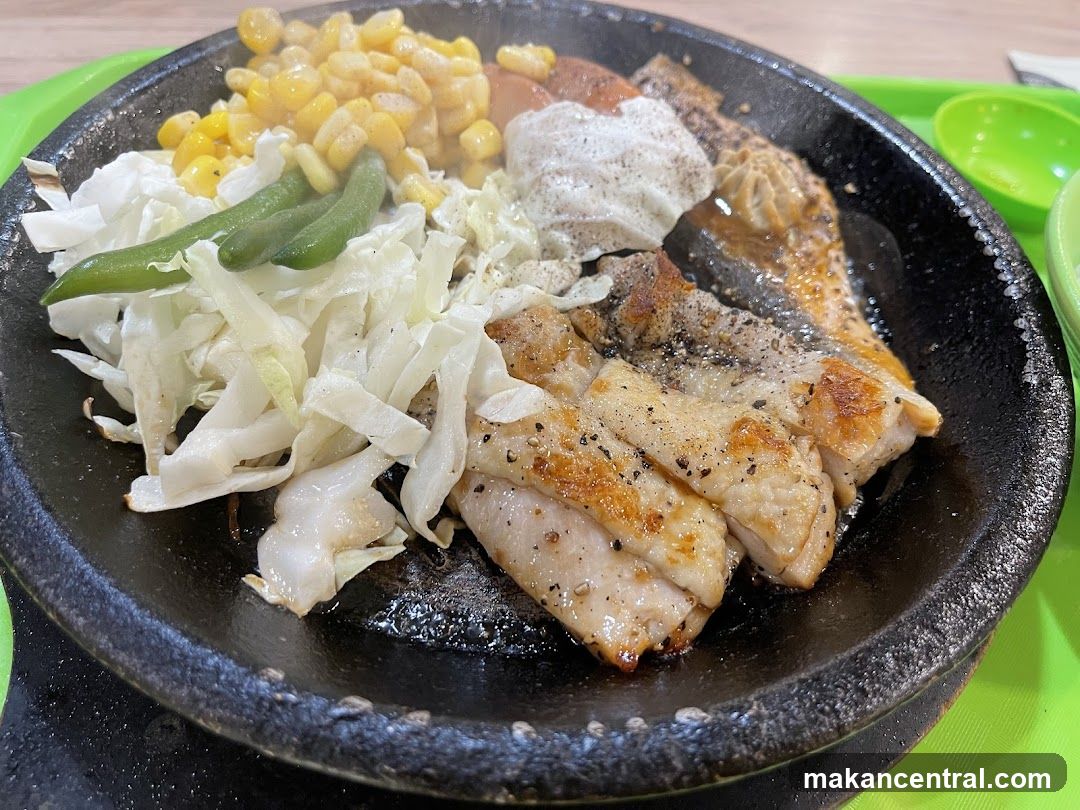Food dish on a sizzling plate