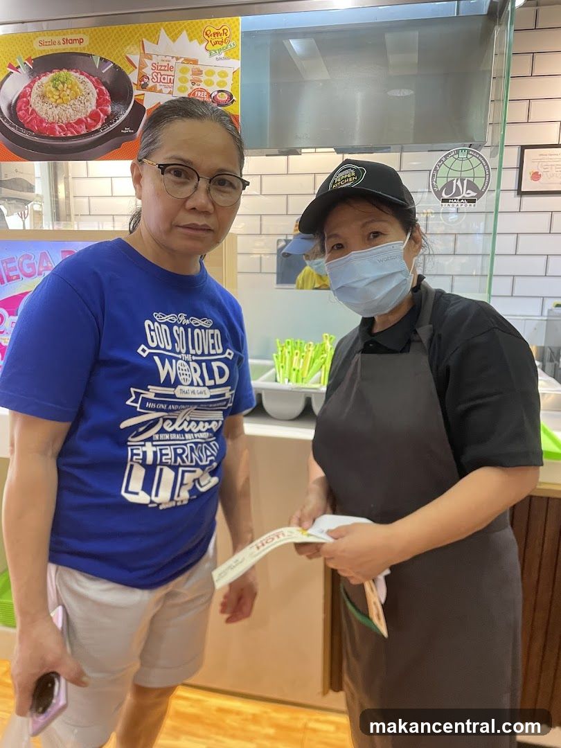 Customer and Staff at Food Counter
