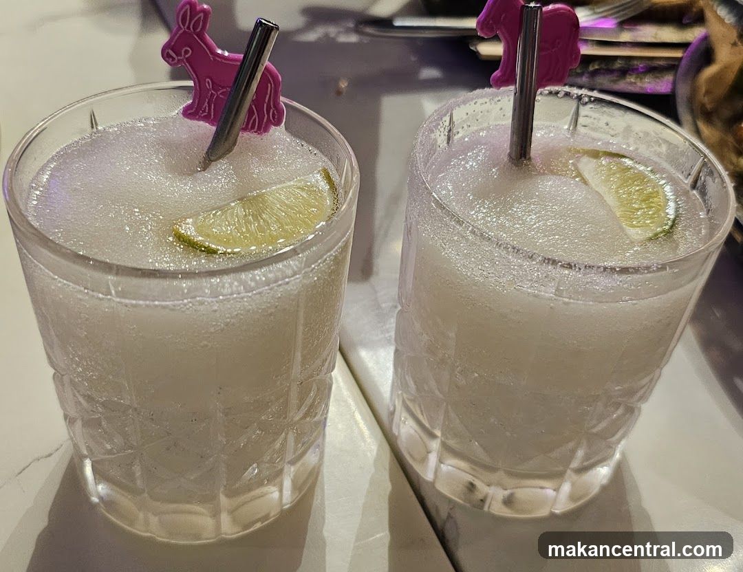 Two cocktails on a table