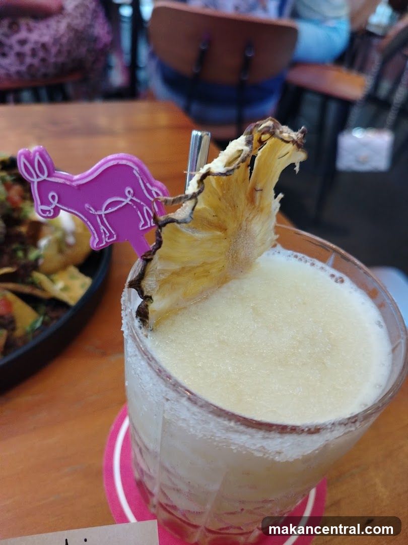 Cocktail with Pineapple Garnish