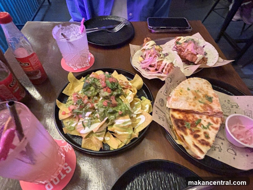 Table with Mexican-style food and drinks