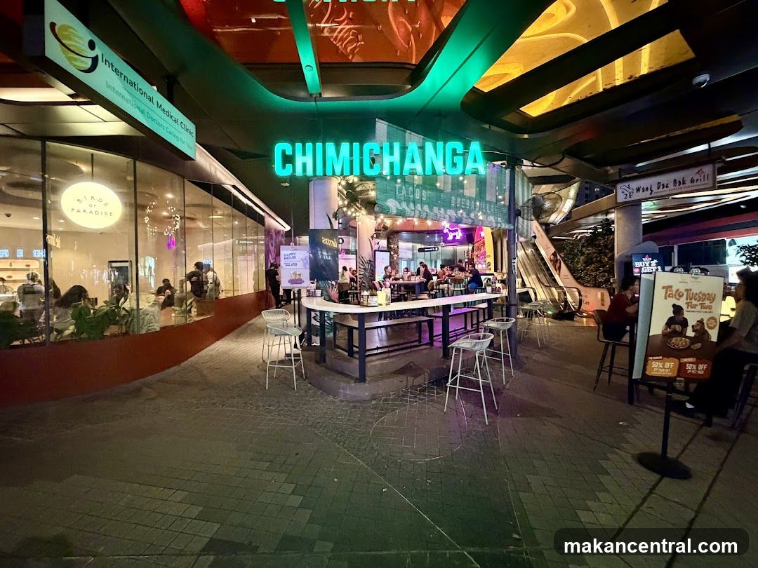 Chimichanga Tacos Barbecue storefront at night