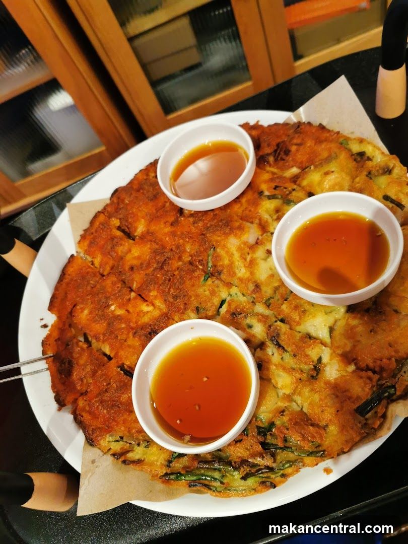 Food Plate with Three Bowls of Sauce