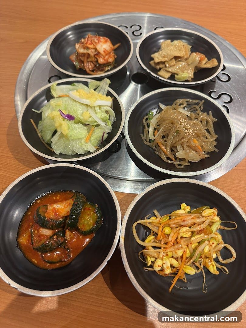 Korean side dishes served on a metal tray