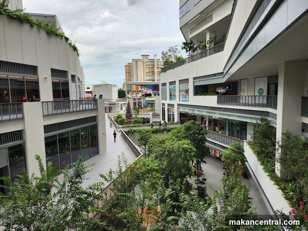Outdoor shopping complex with greenery