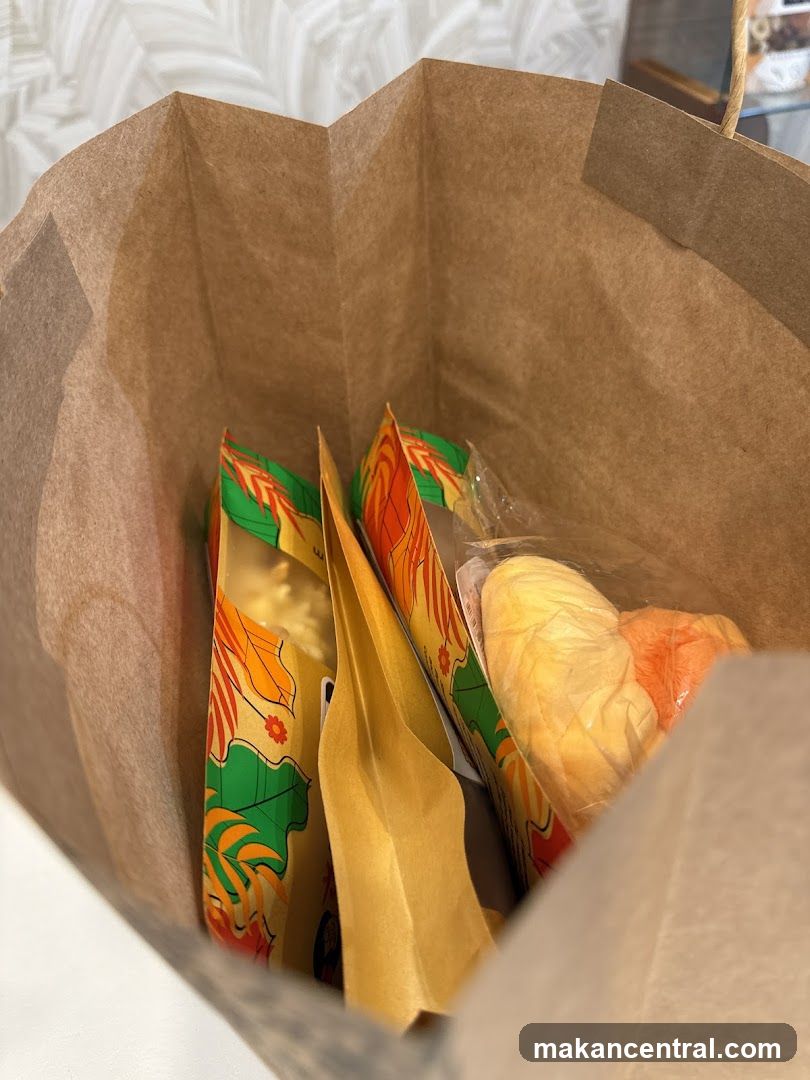 Brown paper bag with packaged food items