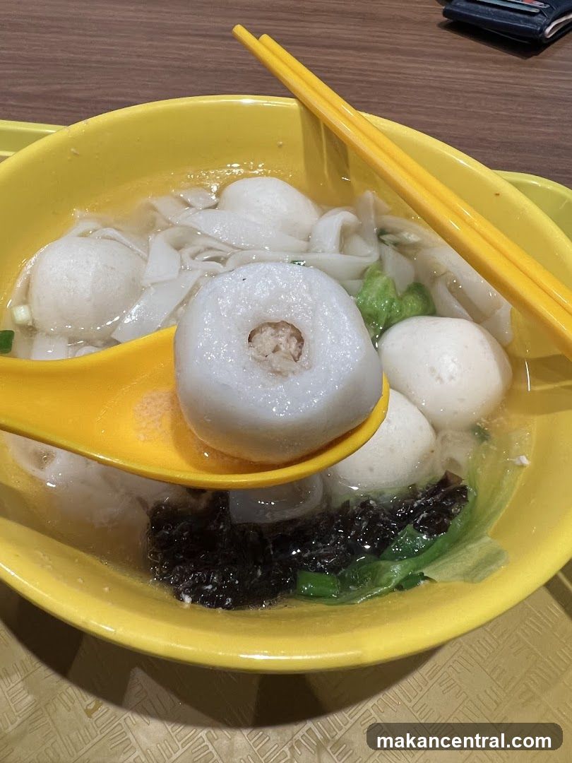 Food in yellow bowl