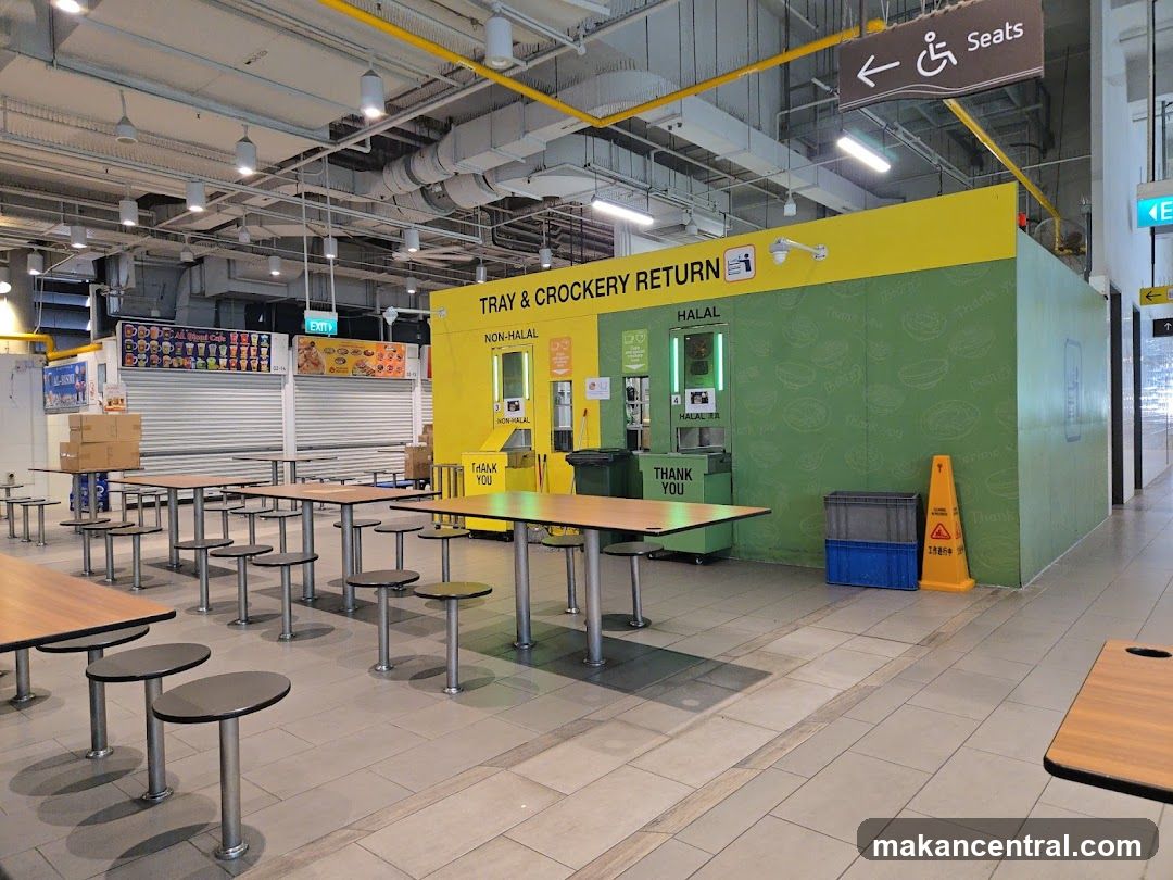 Food court interior with tray return kiosks