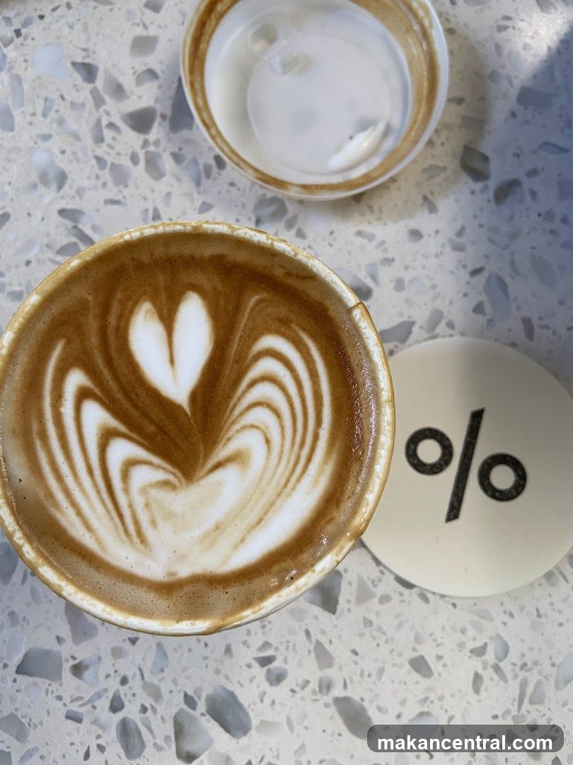 Coffee with latte art on terrazzo surface