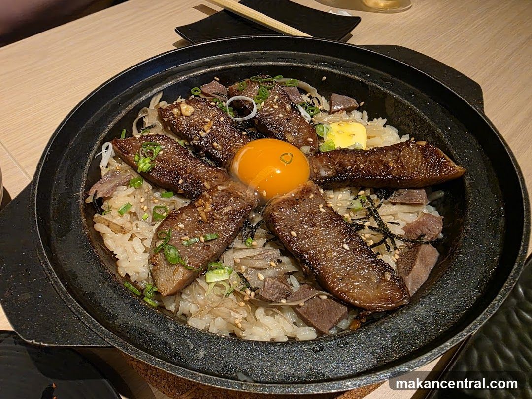 Serving of rice dish in a stone pot