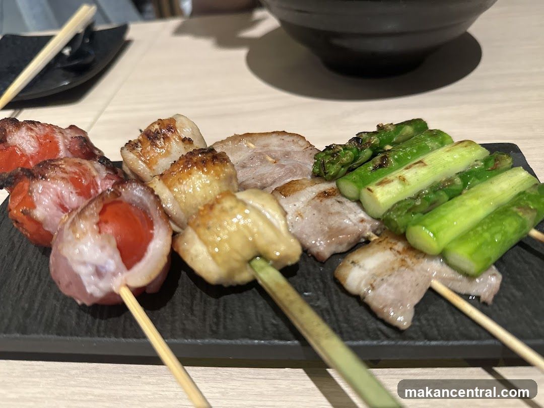 Grilled skewers on slate plate