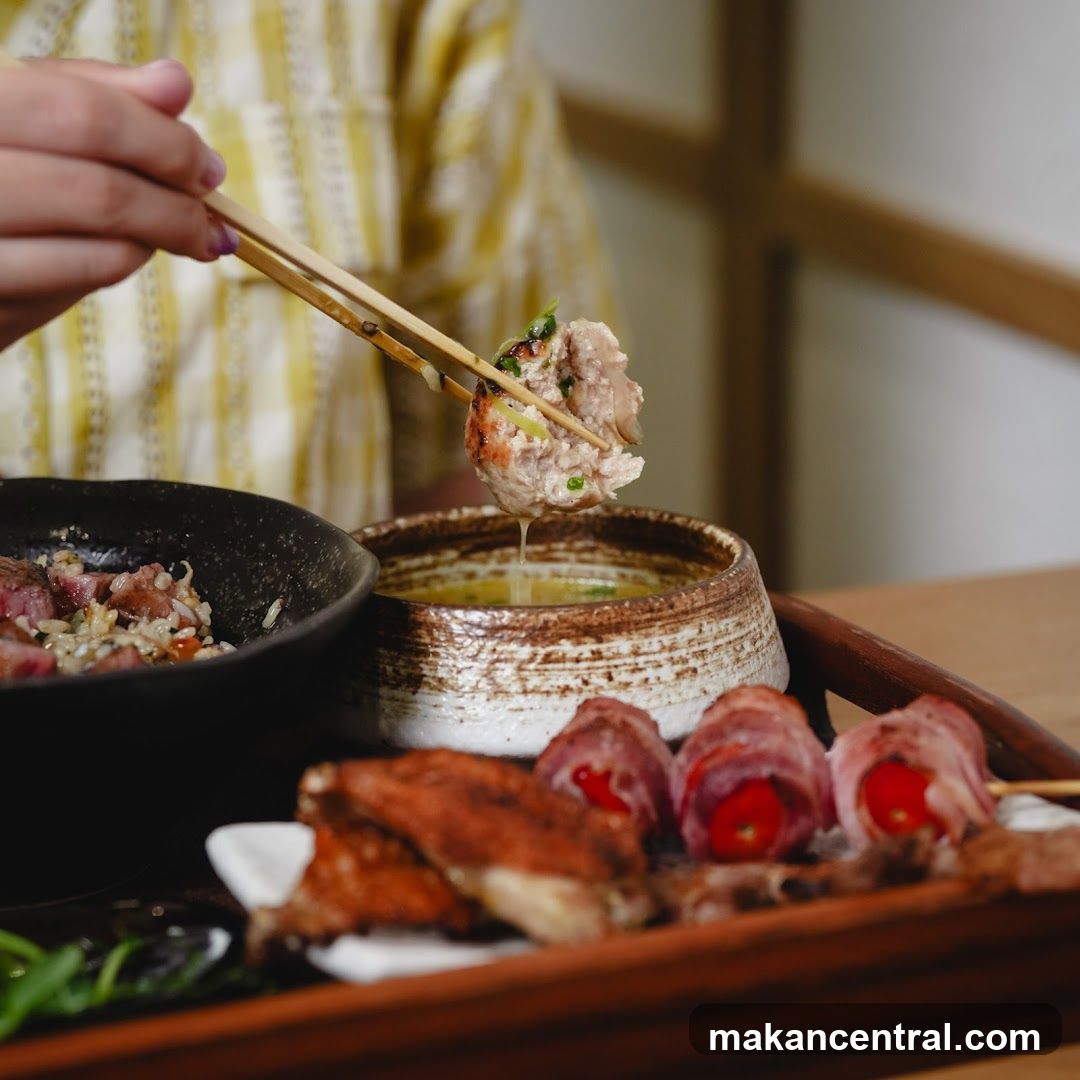Food being dipped in sauce