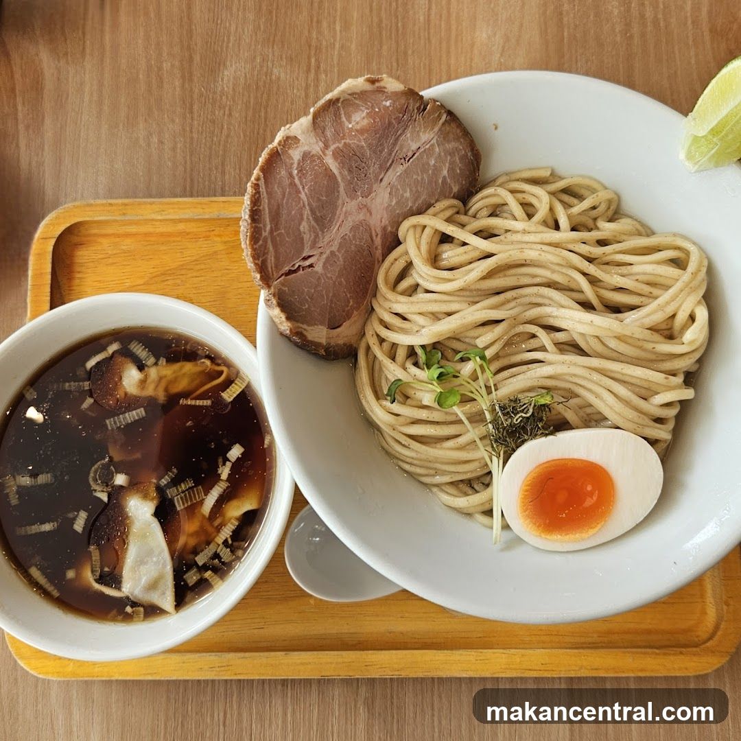 Ramen and side dish on wooden tray